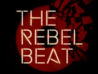 "The Rebel Beat" written over an exploding vinyl record